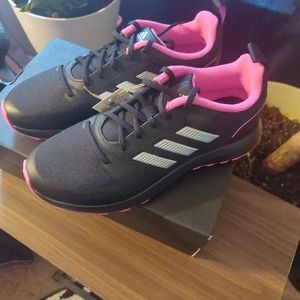 Black, pink bottoms, with gray  stripes on the side.